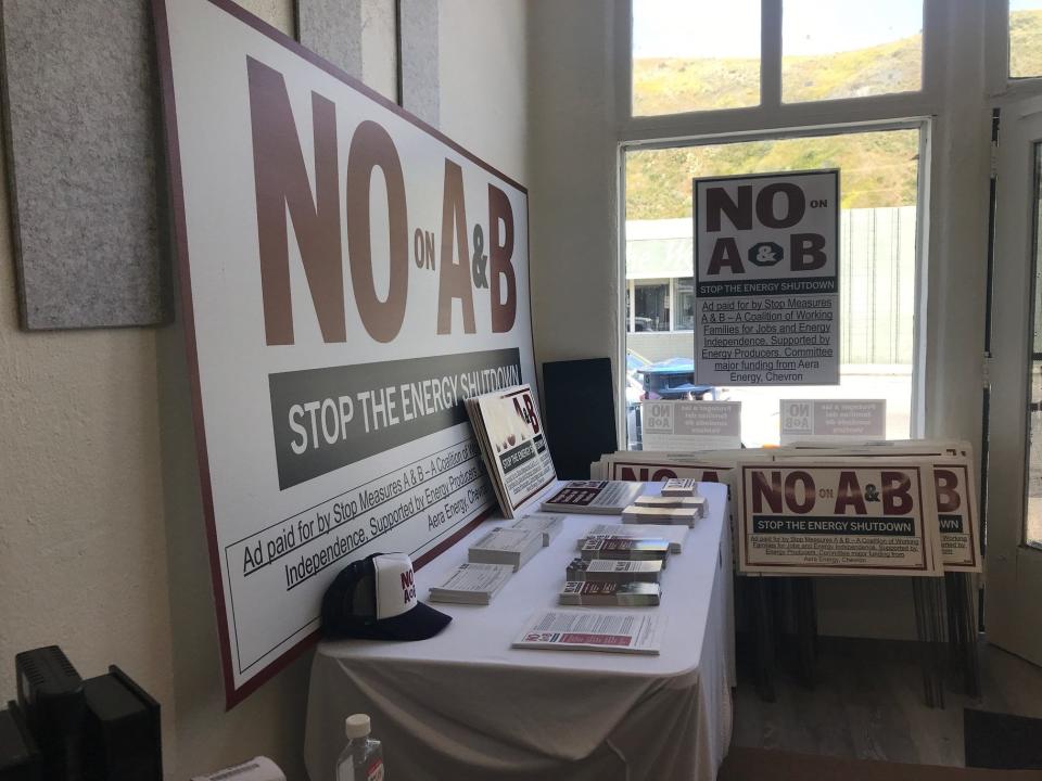 Signs stand in the west Ventura office established for the opposition campaign to Measures A and B.