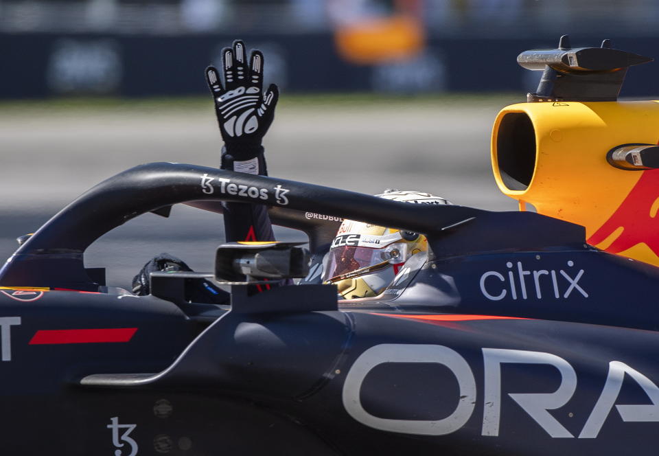 Red Bull driver Max Verstappen, of the Netherlands, waves to the crowd after winning the Canadian Grand Prix auto race in Montreal, Sunday, June 19, 2022. (Graham Hughes/The Canadian Press via AP)