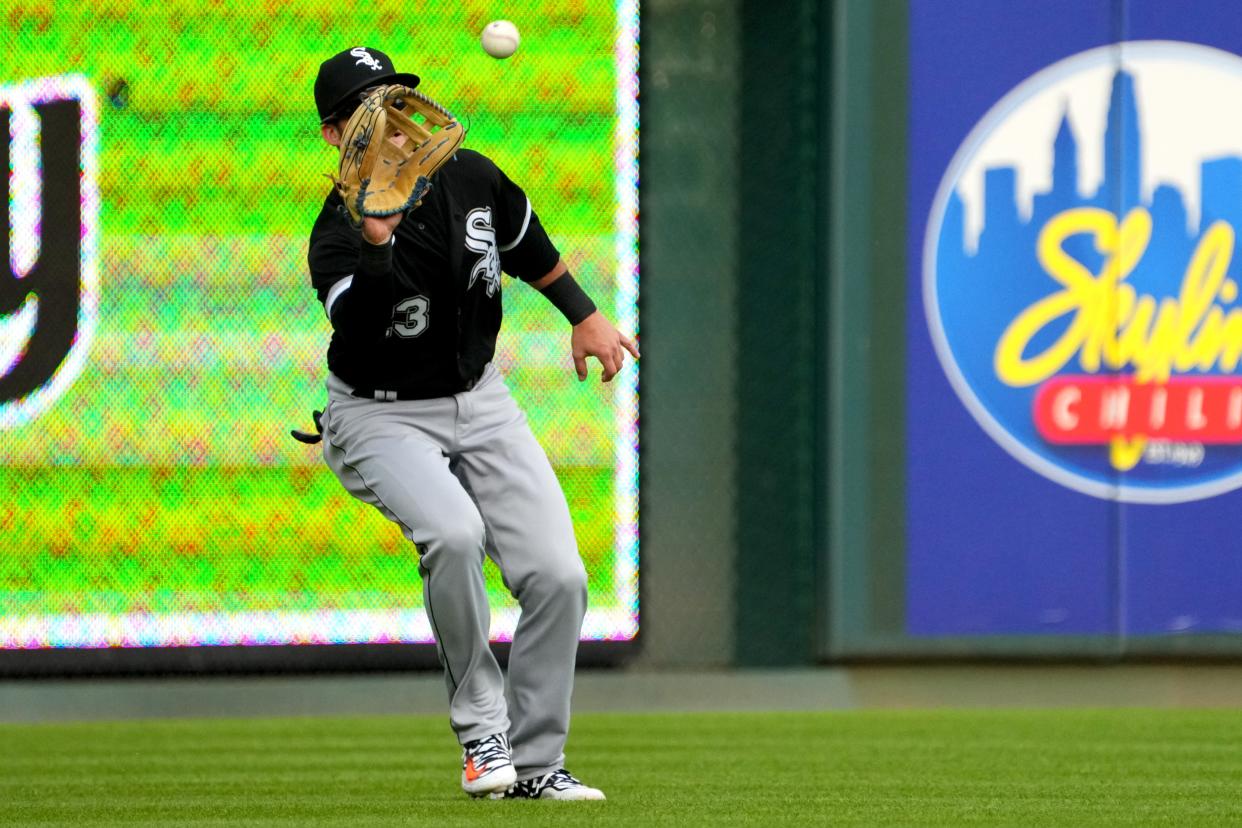 Chicago White Sox left fielder Andrew Benintendi (23) catches a flu ball in the second inning during a baseball game between the Chicago White Sox and the Cincinnati Reds, Saturday, May 6, 2023, at Great American Ball Park in Cincinnati. 