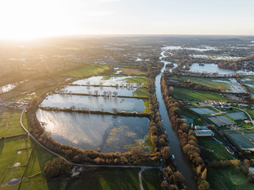 flooded fields and thames river, surrey