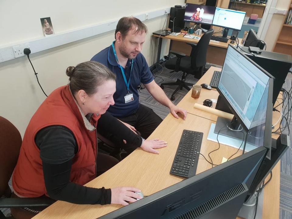 University of Bradford researchers Simon Fitch and Jessica Cook Hale analyze data. Although underwater excavations are exciting, most of underwater archaeologists’ work happens back in the lab.