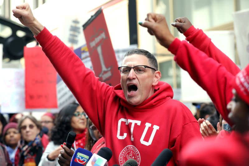 FILE PHOTO: Chicago Teachers Union President Jesse Sharkey cheers during a rally on the first day of a teacher strike in Chicago