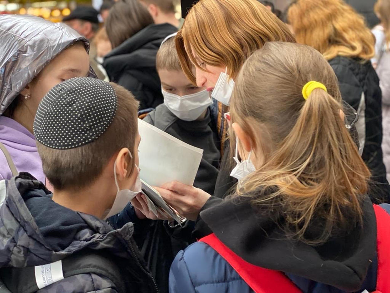 Volunteers and humanitarian workers preparing orphan Ukrainian children to flee from Ukraine as Russian forces began their invasion. (Courtesy The International Fellowship of Christians and Jews)