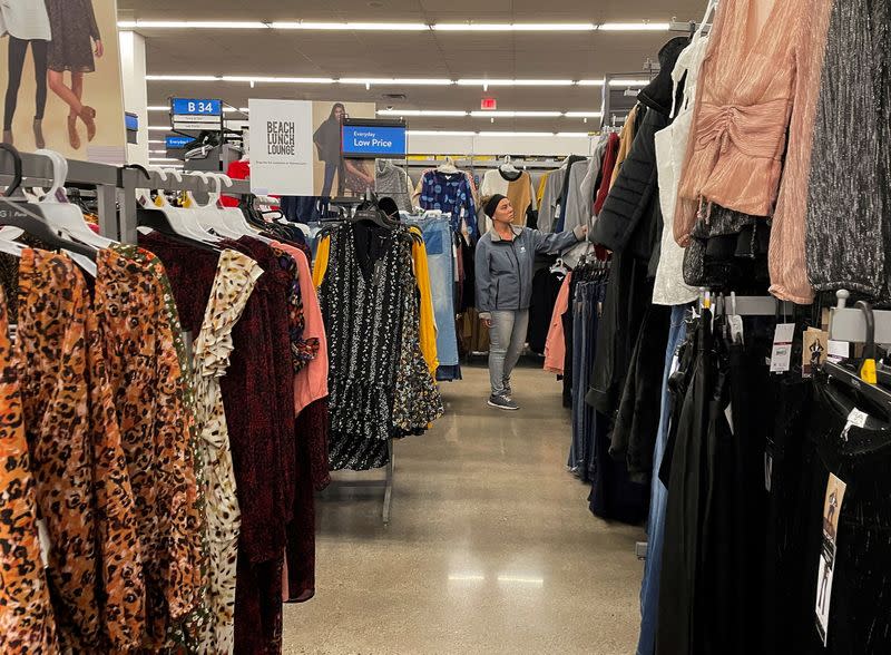 FILE PHOTO: A shopper browses for clothing at a Walmart store in Flagstaff