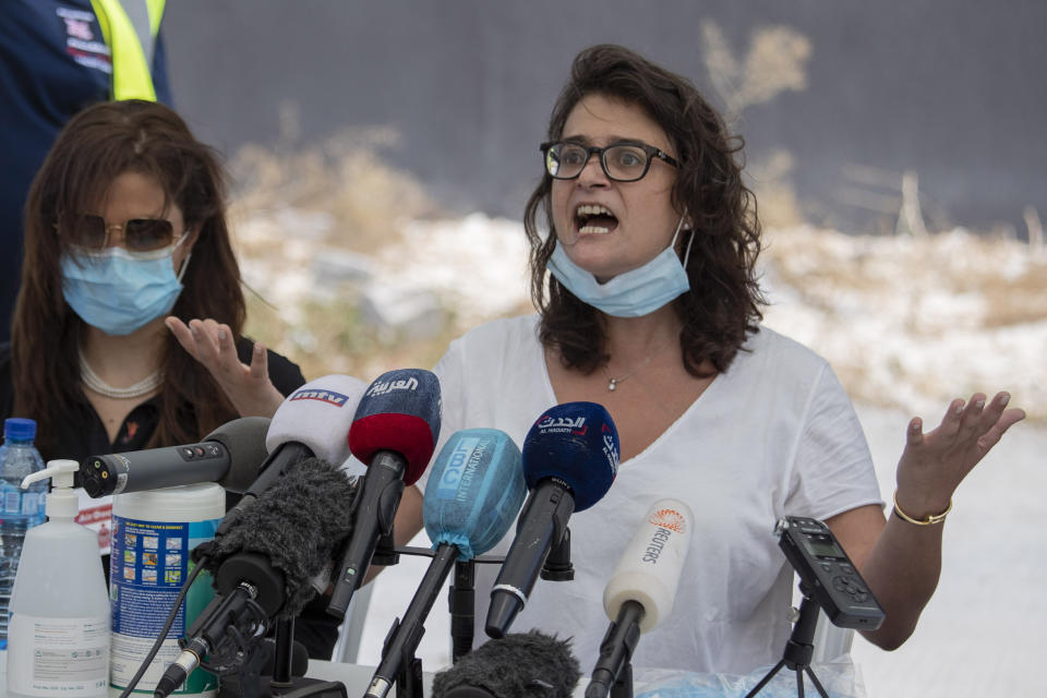 Sara Jaafar, right, speaks during a press conference in Beirut, Lebanon, Friday, Aug. 14, 2020. Jaafar joined a group of political activists gathered on Aug. 4, 2020, to discuss strategies to challenge Lebanon's entrenched rulers, when their building was shaken and the windows blasted out by the giant explosion that rocked Beirut. (AP Photo/Hassan Ammar)