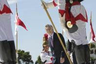 Argentina's President Mauricio Macri receives the military honors during his arrival at the Planalto presidential palace, in Brasilia, Brazil, Wednesday, Jan. 16, 2019. Macri is on a one-day visit to Brazil. (AP Photo/Eraldo Peres)