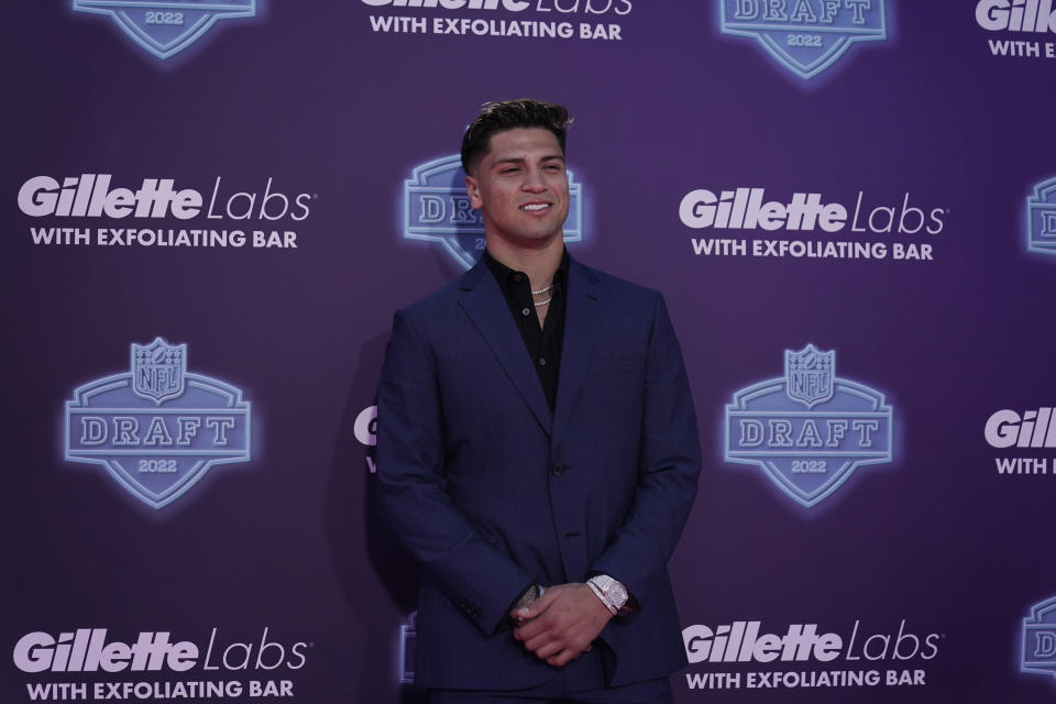 Mississippi quarterback Matt Corral poses on the red carpet before the first round of the NFL football draft Thursday, April 28, 2022, in Las Vegas. (AP Photo/Jae C. Hong )