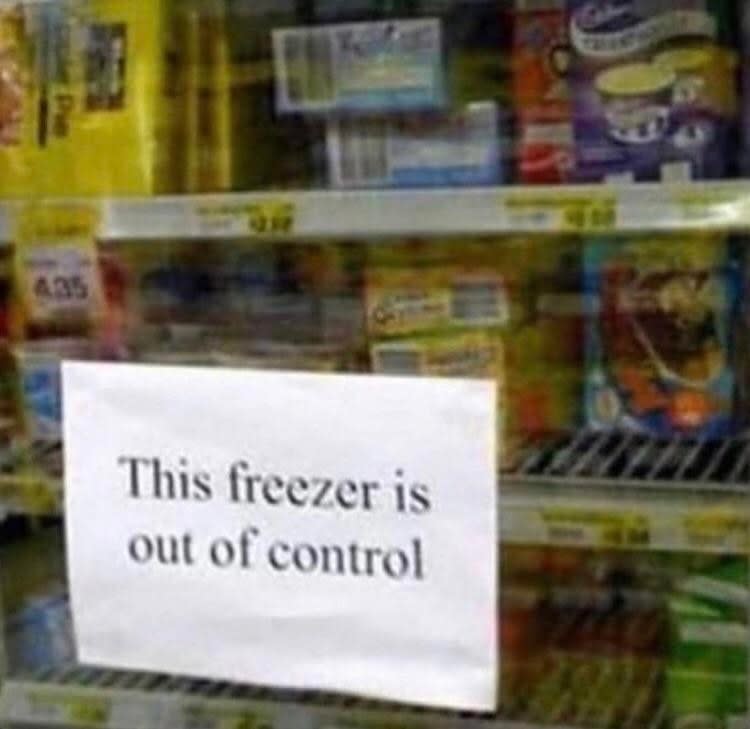 sign reading this freezer is out of control on a store frozen section door