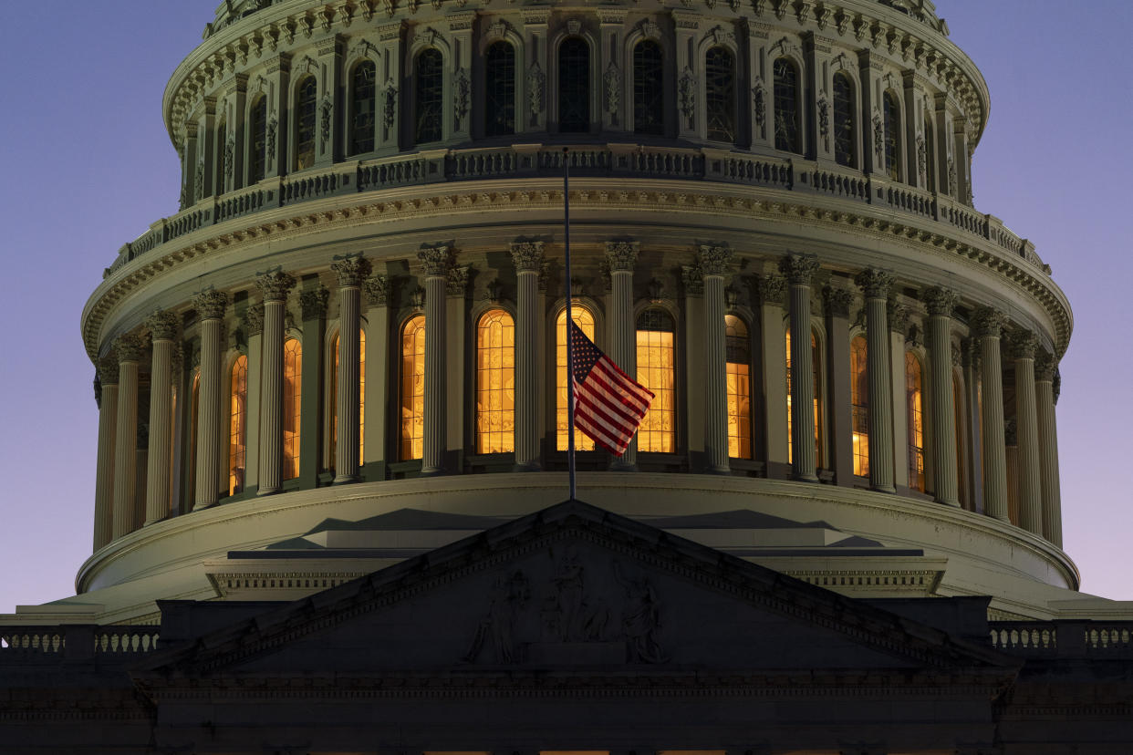 The American flag flies at half-staff over the U.S. Capitol, Thursday, Sept. 8, 2022, on Capitol Hill in Washington, after Queen Elizabeth II died. (AP Photo/Jacquelyn Martin)