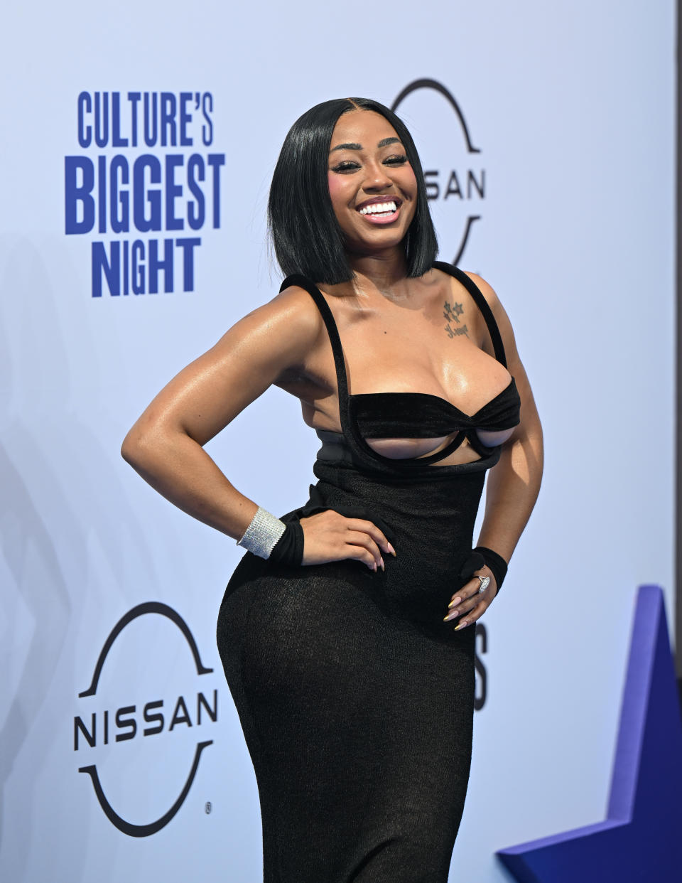 Blac Chyna attends Culture's Biggest Night event in a sleek black dress with cut-out details