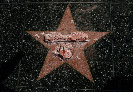 Donald Trump's star on the Hollywood Walk of Fame is seen after it was vandalized in Los Angeles, California U.S., October 26, 2016. REUTERS/Mario Anzuoni