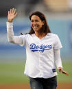 LOS ANGELES, CA - AUGUST 08: US Olympic swimmer Janet Evans waves after throwing the ceremonial first pitch prior to start of the basbeall game between the Philadelphia Phillies and Los Angeles Dodgers at Dodger Stadium on August 8, 2011 in Los Angeles, California. (Photo by Kevork Djansezian/Getty Images)