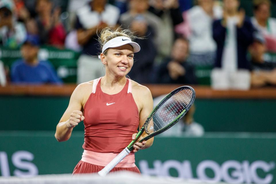 Romania's Simone Halep reacts after her victory against Coco Gauff of the United States during the BNP Paribas Open in Indian Wells, California on March 13, 2022.  