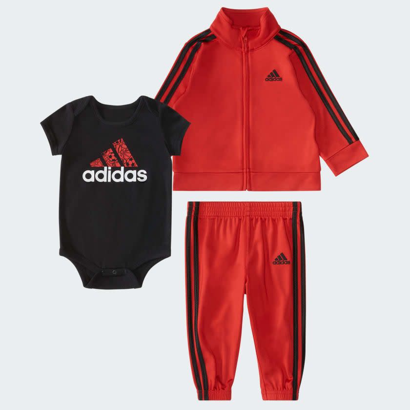 <p><a href="https://go.redirectingat.com?id=74968X1596630&url=https%3A%2F%2Fwww.adidas.com%2Fus%2Fthree-piece-tricot-track-set%2FIR3000.html&sref=https%3A%2F%2F" rel="nofollow noopener" target="_blank" data-ylk="slk:Shop Now;elm:context_link;itc:0;sec:content-canvas" class="link ">Shop Now</a></p><p>Three-Piece Tricot Track Set</p><p>adidas.com</p><p>$35.00</p>