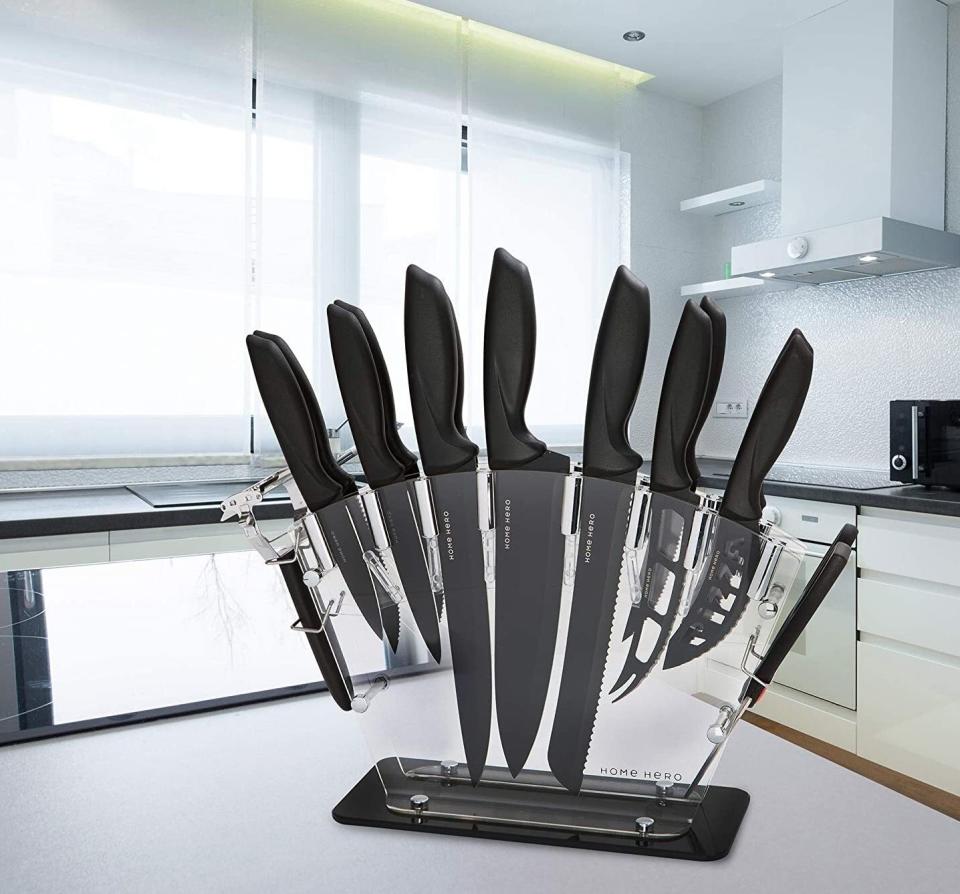 It'll make your kitchen look like a pro chef cooks in it. Plus, the knives are sharp and sturdy and have a nonstick coating on the blades. The set comes with 13 knives, a pair of kitchen scissors, a peeler and a two-stage knife sharpener.<br /><br /><strong>Promising review:</strong> "These knives are great! <strong>They stay super sharp, they&rsquo;re comfortable to hold, and I love how much counter space it leaves as opposed to a big bulky knife block.</strong> Fits perfectly in my minimalist kitchen!!! And it looks great on my counter being one of the few things that I keep on my countertop! It is the perfect amount of knives without being too many knives (I don&rsquo;t like things in excess)! I have never had a cheese knife before, and this baby is my favorite one in the whole set! LOL! It slices through hard cheeses like butter! Have not tried on soft cheese, but I&rsquo;m sure it&rsquo;ll be great because it is super sharp! I can&rsquo;t say enough about how much I love these knives!!" &mdash; <a href="https://amzn.to/3sqZ5ty" target="_blank" rel="nofollow noopener noreferrer" data-skimlinks-tracking="5723569" data-vars-affiliate="Amazon" data-vars-href="https://www.amazon.com/gp/customer-reviews/R2YQYNMNYJDPIN?tag=bfjasmin-20&amp;ascsubtag=5723569%2C8%2C31%2Cmobile_web%2C0%2C0%2C0" data-vars-keywords="cleaning" data-vars-link-id="0" data-vars-price="" data-vars-retailers="Amazon">Sadie Allen</a><br /><br /><strong>Get a 17-piece set from Amazon for <a href="https://amzn.to/3x42C4A" target="_blank" rel="noopener noreferrer">$49.99</a> (available in two colors, also available as a seven-piece set).</strong>