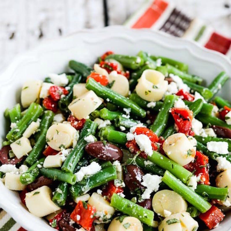 <p>Kalyn's Kitchen</p><p>This bright salad features fresh green beans, which are SO good in salads. You'll love it!</p><p><strong>Get the recipe: <a href="https://kalynskitchen.com/green-bean-salad-recipe-with-hearts-of/" rel="nofollow noopener" target="_blank" data-ylk="slk:Green Bean Salad with Hearts of Palm, Olives, Red Pepper and Feta;elm:context_link;itc:0;sec:content-canvas" class="link ">Green Bean Salad with Hearts of Palm, Olives, Red Pepper and Feta</a></strong></p>