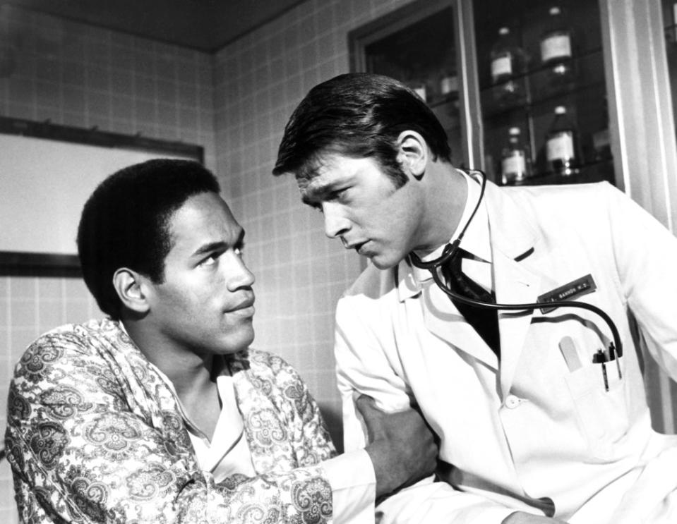O.J. Simpson and Chad Everett in a 1969 episode of the CBS series “Medical Center.” Simpson signed his contract for the show before inking his deal with the Buffalo Bills. Everett Collection / Everett Collection