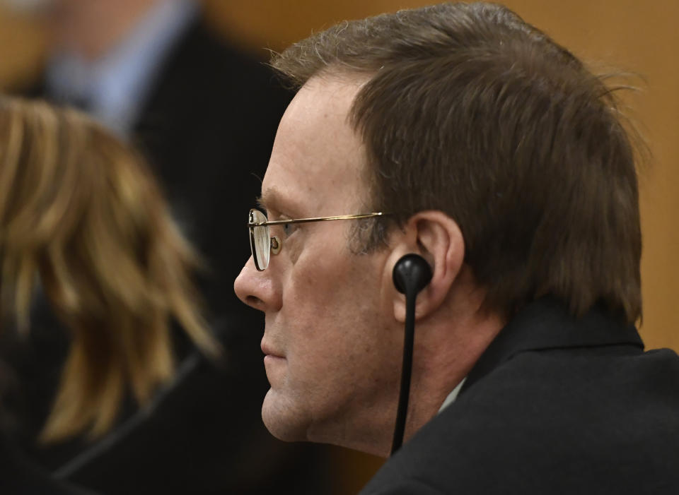 Mark Jensen listens as his guilty verdict is read by Judge Anthony Milisauskas at the Kenosha County Courthouse on Wednesday, Feb. 1, 2023, in Kenosha, Wis. The Wisconsin Supreme Court ruled in 2021 that Jensen deserved a new trial in the 1998 death of his wife Julie Jensen, who was poisoned with antifreeze. (Sean Krajacic/The Kenosha News via AP, Pool)