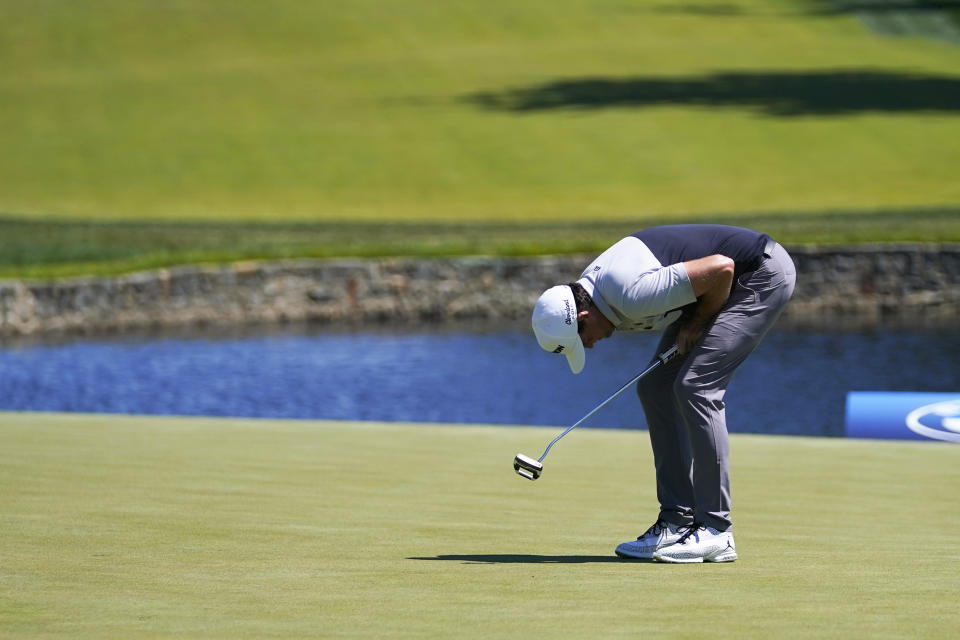 Keegan Bradley reacts to a missed putt on the 12th green during the first round of the BMW Championship golf tournament at Wilmington Country Club, Thursday, Aug. 18, 2022, in Wilmington, Del. (AP Photo/Julio Cortez)