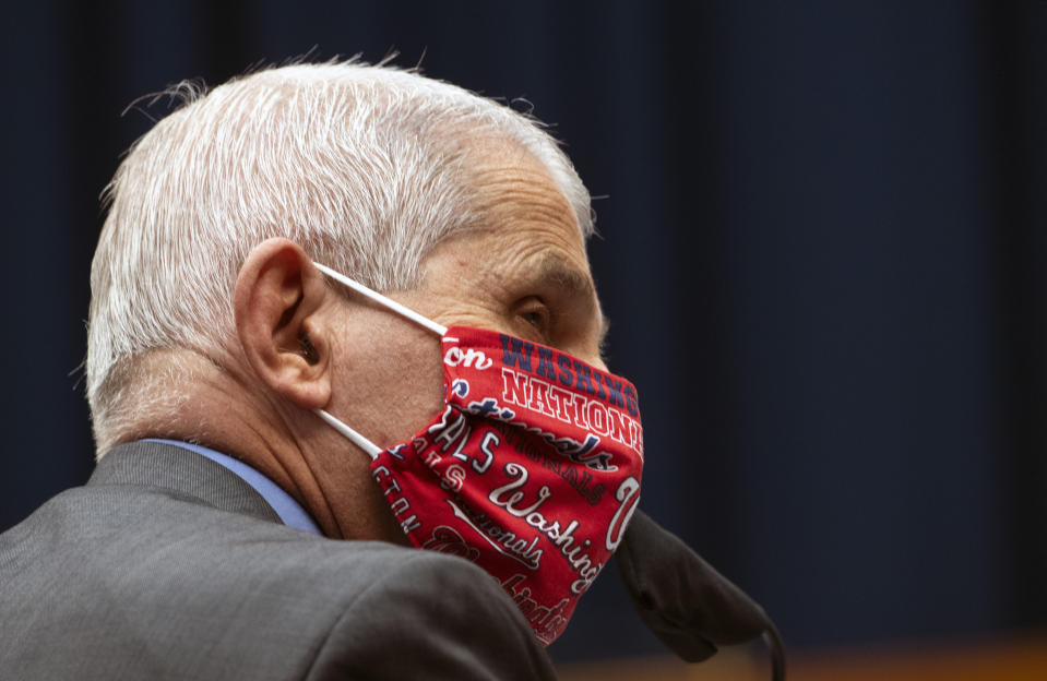 Director of the National Institute of Allergy and Infectious Diseases Dr. Anthony Fauci wears a face mask and listens during a House Committee on Energy and Commerce hearing on the Trump administration's response to the COVID-19 pandemic on Capitol Hill in Washington on Tuesday, June 23, 2020. (Kevin Dietsch/Pool via AP)