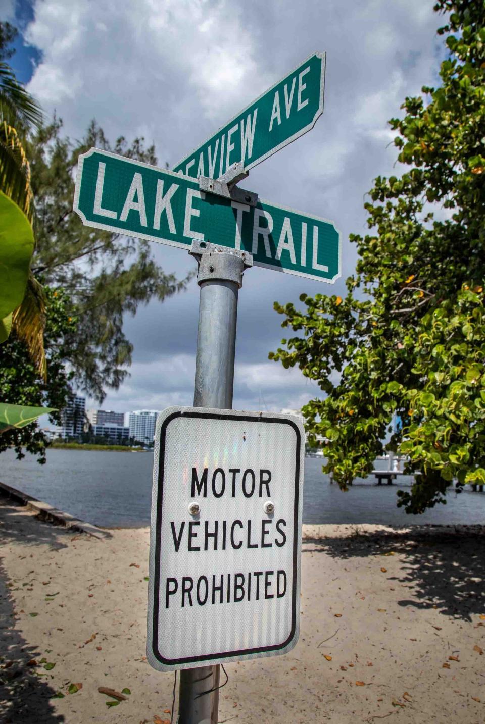 A sign on the Lake Trail states motor vehicles are prohibited.