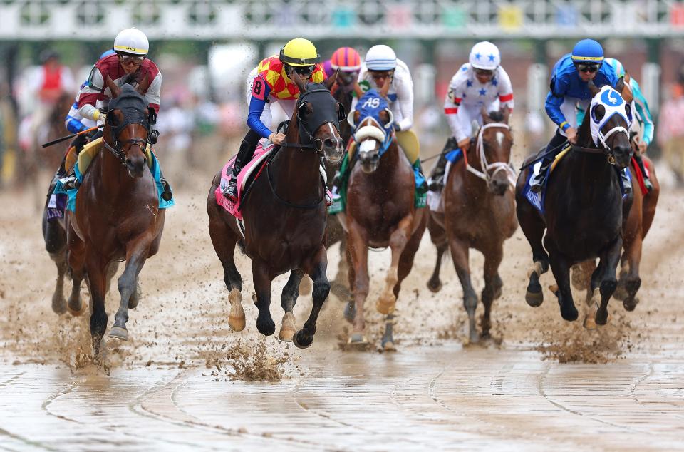 LOUISVILLE, KENTUCKY - MAY 03: Horses run during an undercard race at Churchill Downs on May 03, 2024 in Louisville, Kentucky. The 150th running of the Kentucky Derby will take place Saturday. (Photo by Kevin C. Cox/Getty Images)
