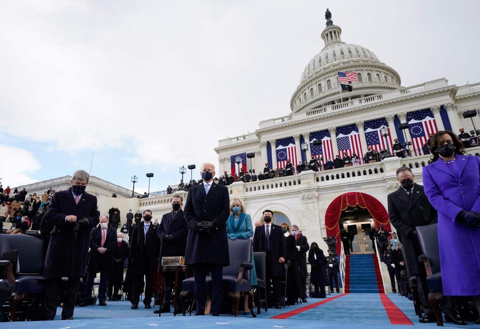 Vice President Kamala Harris and President Joe Biden stand during his inauguration as the 46th US President, on the West Front of the US Capitol in Washington, DC on January 20, 2021.