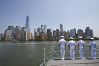 <p>Crew members of Her Majesty Canadian Ship Athabaskan stand guard as they sail past lower Manhattan, Wednesday, May 25, 2016. The annual Fleet Week is bringing a flotilla of activities, including a parade of ships sailing up the Hudson River and docking around the city. The events continue through Memorial Day. (AP Photo/Mary Altaffer) </p>