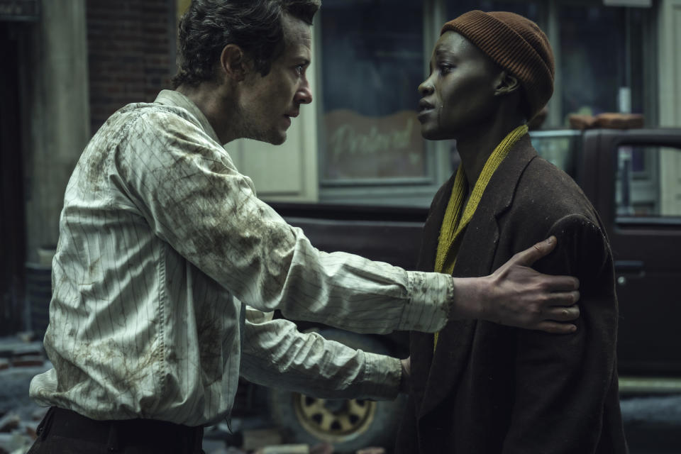 This image released by Paramount Pictures shows Joseph Quinn, left, and Lupita Nyong'o in a scene from "A Quiet Place: Day One." (Gareth Gatrell/Paramount Pictures via AP)