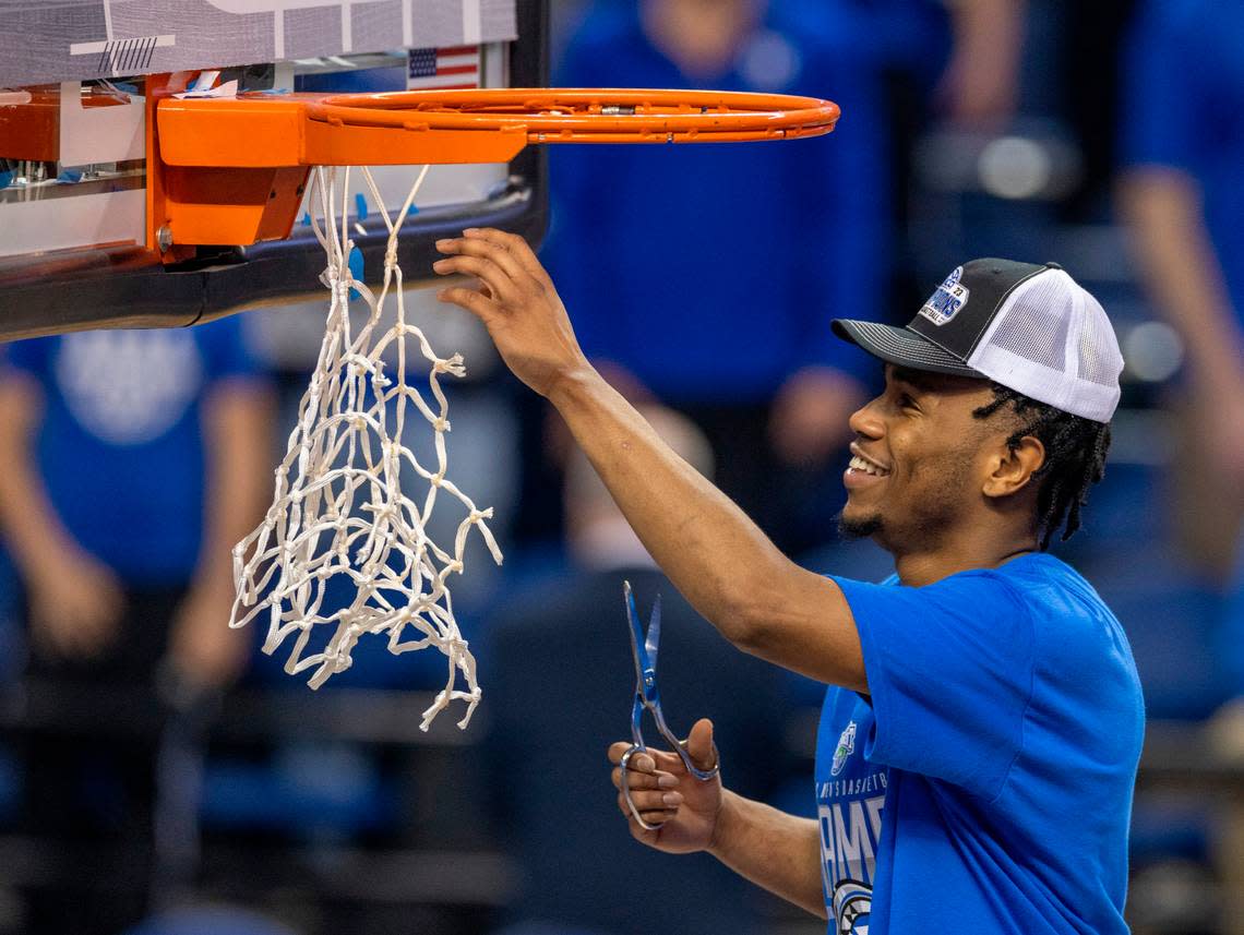 Duke’s Jeremy Roach (3) celebrates by cutting down the net after leading the Blue Devils to an ACC Tournament Championship with a 59-49 victory over Virginia on Saturday, March 11, 2023 at the Greensboro Coliseum in Greensboro, N.C.