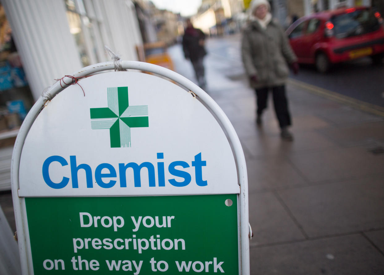 BATH, ENGLAND - FEBRUARY 12:  A chemist sign is displayed outside a independent chemist shop on February 12, 2016 in Bath, England. One in four high street pharmacies could close as the Government cuts £170 million from the prescription handling fees paid to them.  (Photo by Matt Cardy/Getty Images)