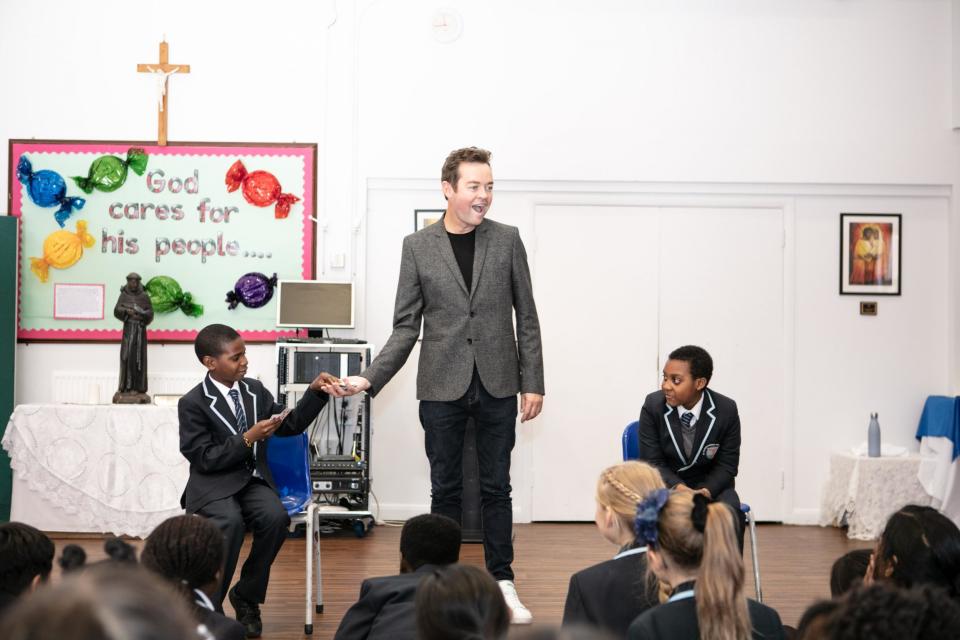 Stephen Mulhern at St Francis' Catholic primary school in Stratford (Virgin Media)