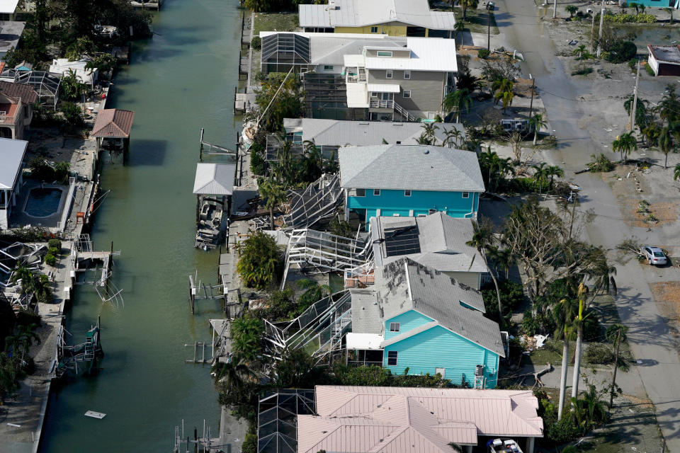 <p>Rows of homes are damaged along Fort Myers Beach on Sept. 29.</p>