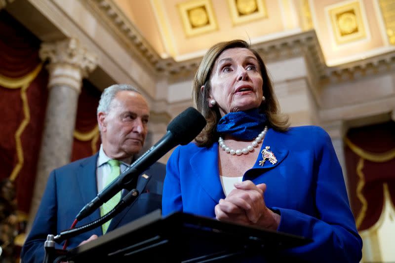 U.S. Speaker of the House Pelosi, joined by Senate Minority Leader Schumer, speaks to reporters in the U.S. Capitol in Washington