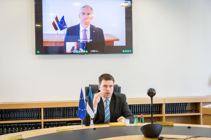 Estonian Prime Minister Ratas attends a video call with his Latvian counterpart Karins and Lithuanian Prime Minister Skvernelis