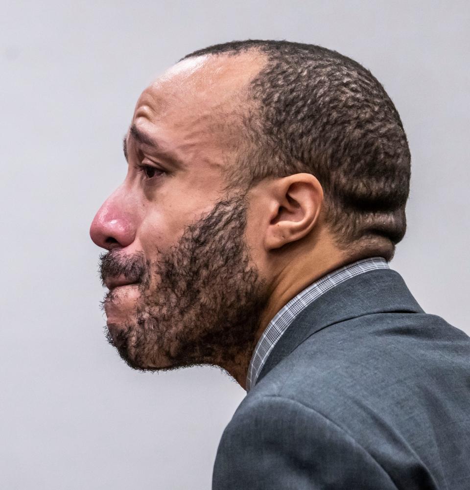 Defendant Darrell Brooks fights back tears as he makes his opening statement to the jury in a Waukesha County Circuit Court in Waukesha Thursday.
