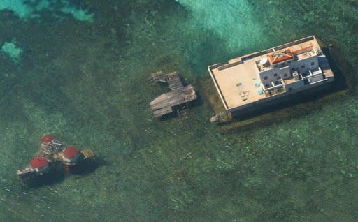 File photo of Chinese built structures on Mischief Reef in the disputed Spratly islands in the South China Sea. Vietnam is determined to protect the "incontestable" sovereignty of two South China Sea archipelagos, the prime minister said in a report Thursday, intensifying a war of words with China
