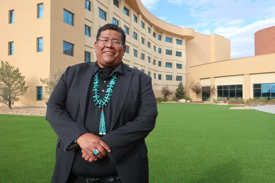 Dineh Benally poses for a photograph before a Navajo Nation presidential forum at a tribal casino outside Flagstaff, Ariz., Tuesday, June 21, 2022. Chinese workers allege they were lured to northern New Mexico under false pretenses and forced to work 14 hours a day trimming marijuana on the Navajo Nation where cultivating the plant is illegal, according to a lawsuit filed Wednesday, Sept. 27, 2023, in state court. The lawsuit names as defendants Navajo businessman Benally and Taiwanese entrepreneur Irving Lin, who was arrested in 2022 following a raid in California.