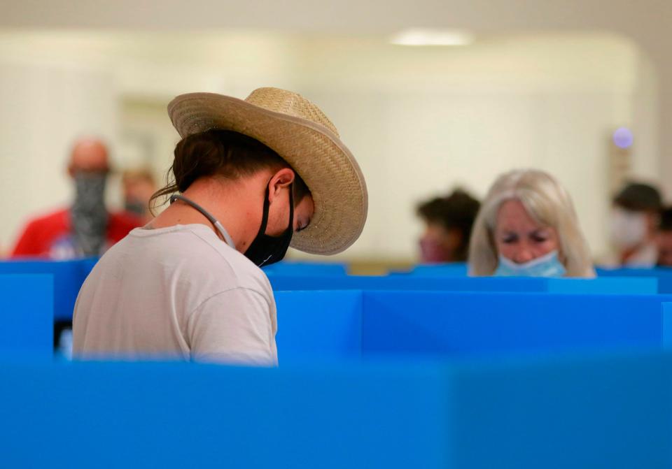 <p>Voters making their selections this morning at the Oak Park Community Center Tuesday, Nov. 3, 2020, in Oak Park, Mich. (Clarence Tabb, Jr./Detroit News via AP)</p> (AFP via Getty Images)