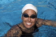 Former Olympic swimmer Janet Evans trains in Huntington Beach, Calif., Thursday, June 9, 2011. (AP Photo/Chris Carlson)