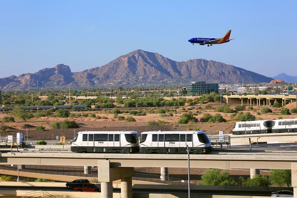 <p>Love watching planes land and take off? Get on board the <a href="https://www.skyharbor.com/Media_old/WhatsHappening/Pre2013Archives/2015/05/27/phx-sky-train-takes-first-official-ride-over-taxiway" rel="nofollow noopener" target="_blank" data-ylk="slk:PHX Sky Train;elm:context_link;itc:0;sec:content-canvas" class="link ">PHX Sky Train</a>. Located at the Phoenix Sky Harbor International Airport, the trains cross over an active airport taxiway. It's the first system in the world to do this! </p>