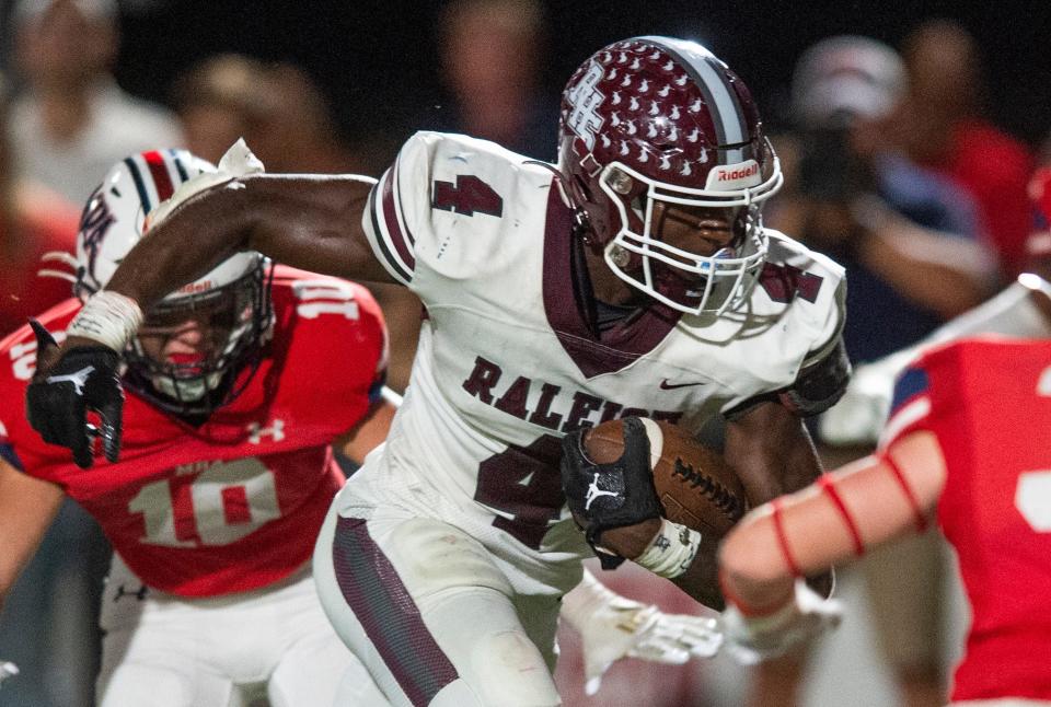 Raleigh running back Suntarine Perkins carries against Madison-Ridgeland in Madison, Friday, Sept. 23, 2022.