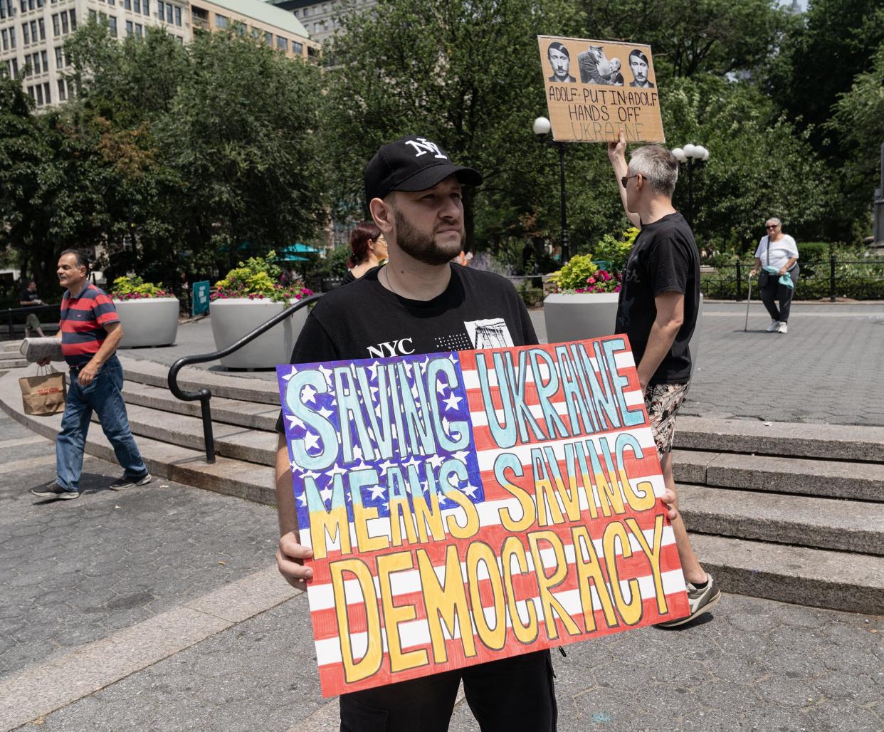 NEW YORK, UNITED STATES - 2023/07/01: A protester holding a placard gathered on Union Square in support of Ukraine and to call for more weapons and ammunitions to be sent to Ukraine to help defeat Russia.
