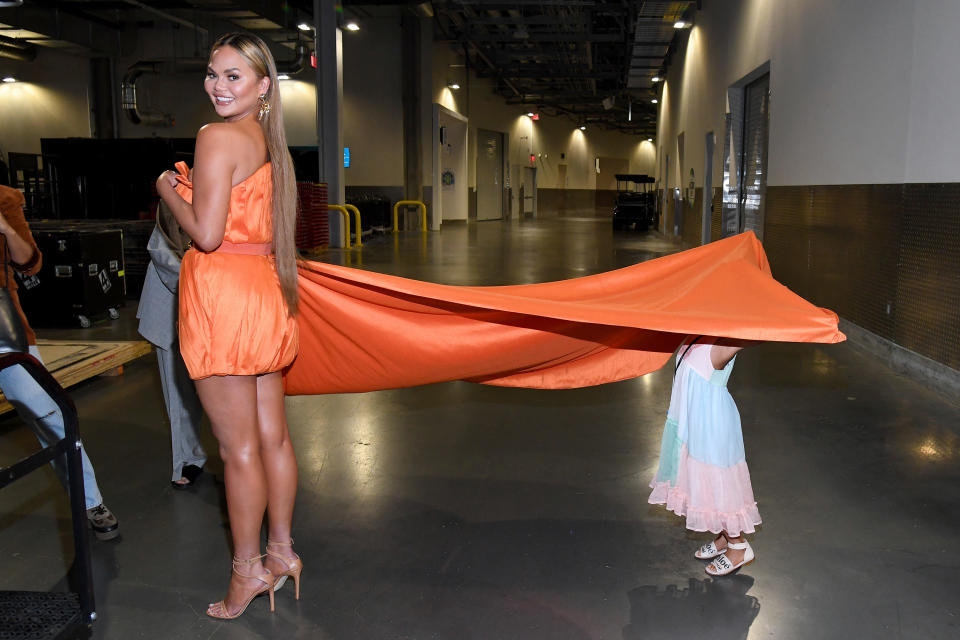 Chrissy Teigen is photographed backstage at an event