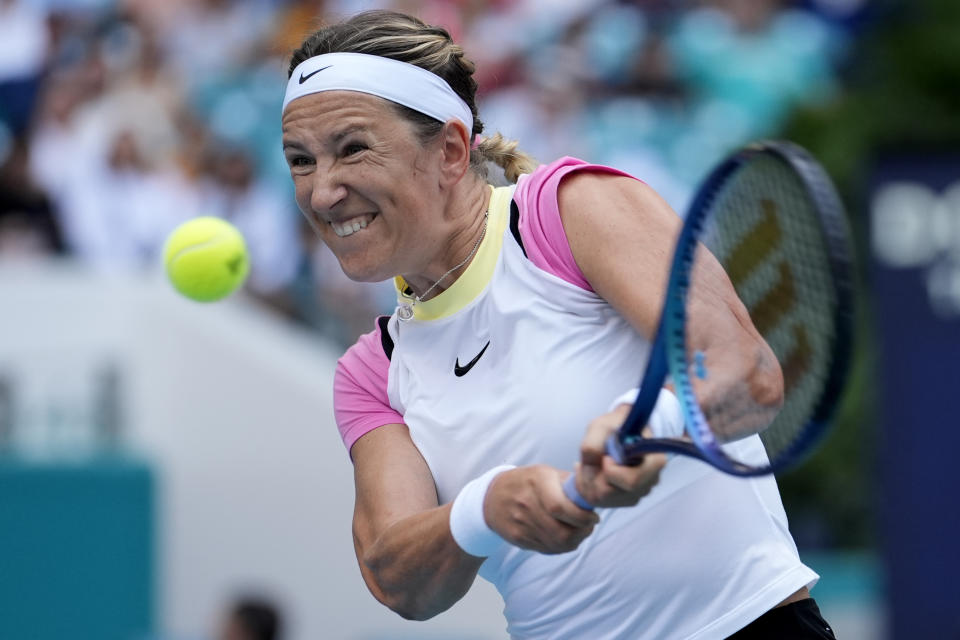 Victoria Azarenka, of Belarus, hits a return to Elena Rybakina, of Kazakhstan, during a quarterfinal match at the Miami Open tennis tournament, Thursday, March 28, 2024, in Miami Gardens, Fla. (AP Photo/Lynne Sladky)