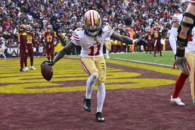49ers WR Brandon Aiyuk continues to hint at playing with Commanders QB  Jayden Daniels - Yahoo Sports