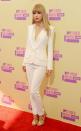 <p>Taylor Swift made a huge statement in this sleek, white look with straight hair in 2012. Previously, she had rocked her signature corkscrew locks and frilly gowns.</p>