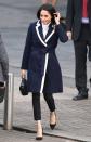 <p>For an early springtime appearance in Birmingham, Markle opted for a navy and white piped wool wrap coat from J. Crew.</p>
