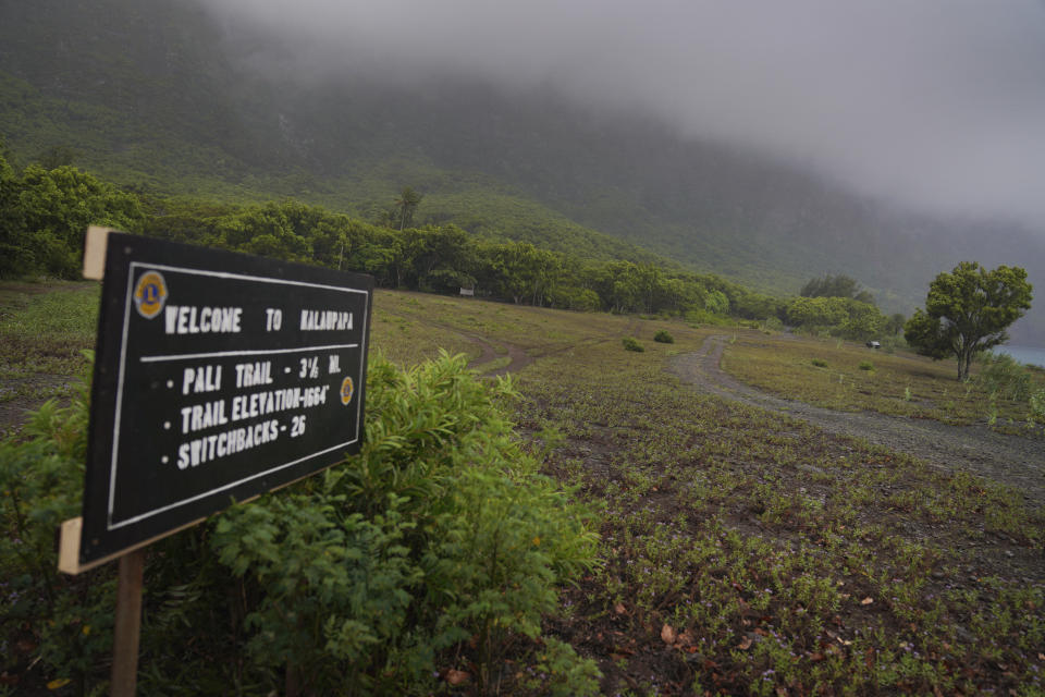 A path leading to the cliffs of Kalaupapa, Hawaii, on Wednesday, July 19, 2023. Banishing the sick to the isolated Kalaupapa settlement was once the government's answer to a deadly leprosy outbreak in the 1800s that persisted into the next century. (AP Photo/Jessie Wardarski)