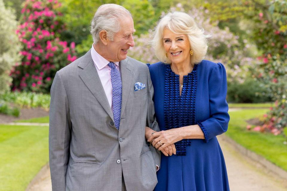 <p>Buckingham Palace/PA Wire </p> King Charles and Queen Camilla photographed on April 10, 2023 to mark the first anniversary of their coronation